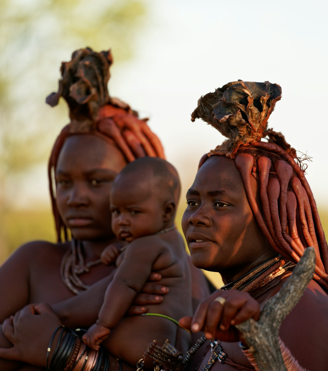 a person carrying a baby